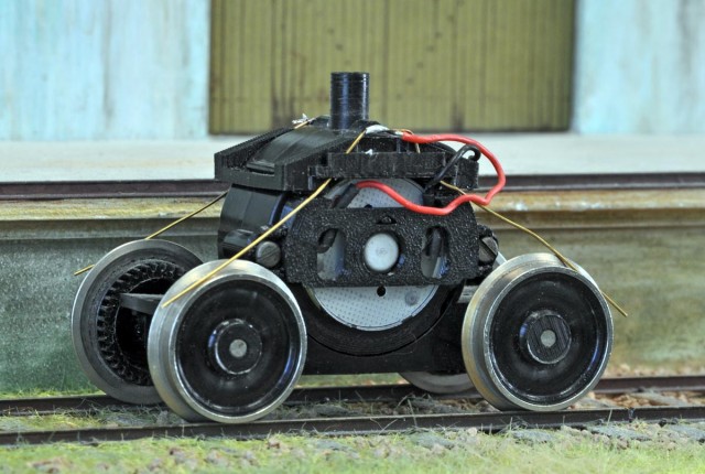Le bogie LIMA remotorisé.  https://www.strathpefferjunction.com/o-gauge-ringfield-motor-upgrade-kits-for-lima-locomotives/
